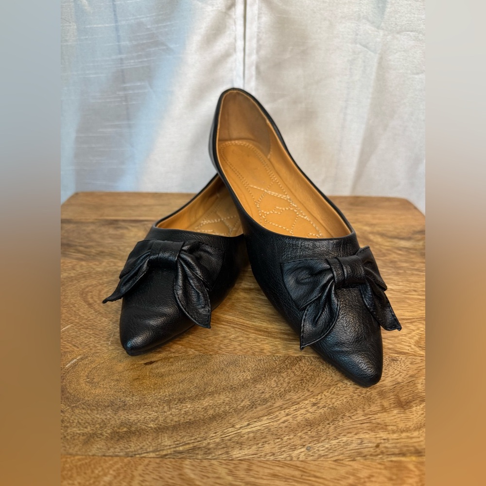 Black Pointed-Toe Flats with Bow Detail